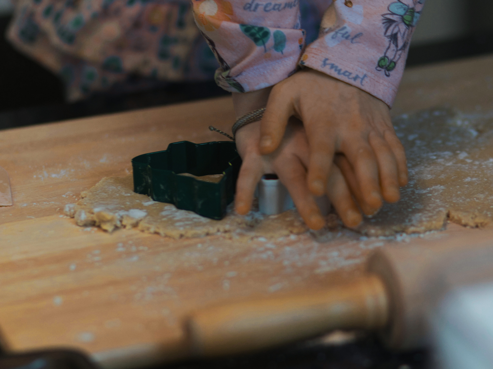 A kid making biscuits